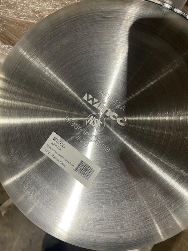 BRAND NEW Winco Gladiator Collection 12” aluminum fry pan, model AFP12A. Features natural finish, NSF certified.