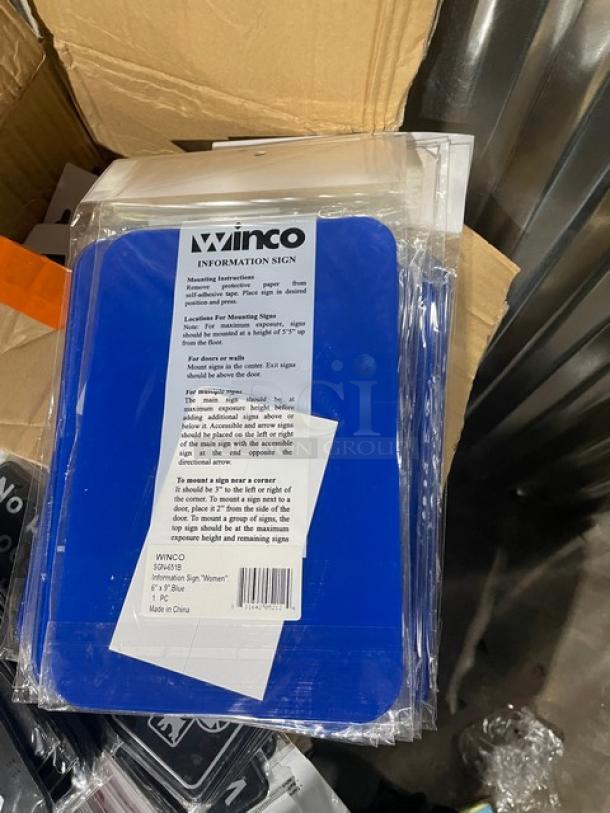 Winco SGN-651B blue "Women/Accessible" sign, brand new, in packaging. Model details and instructions included.