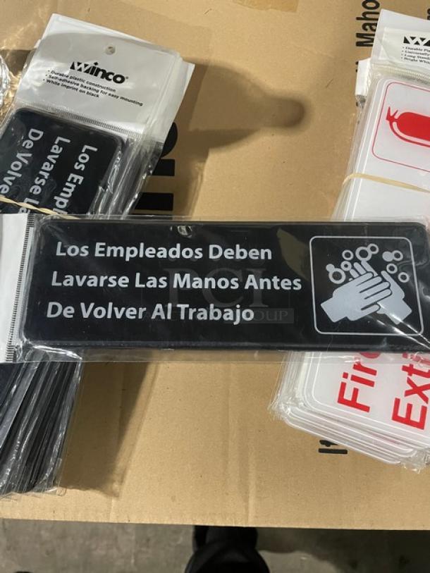 Winco SGN-360 black sign, Spanish "Employees Must Wash Hands," new condition, plastic, commercial use.