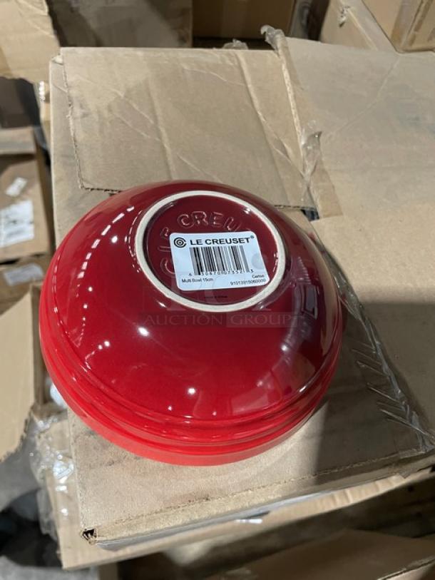 Brand new Le Creuset Cerise red stoneware 6" round bowl, 20 oz., model 91013915060000, in original packaging.