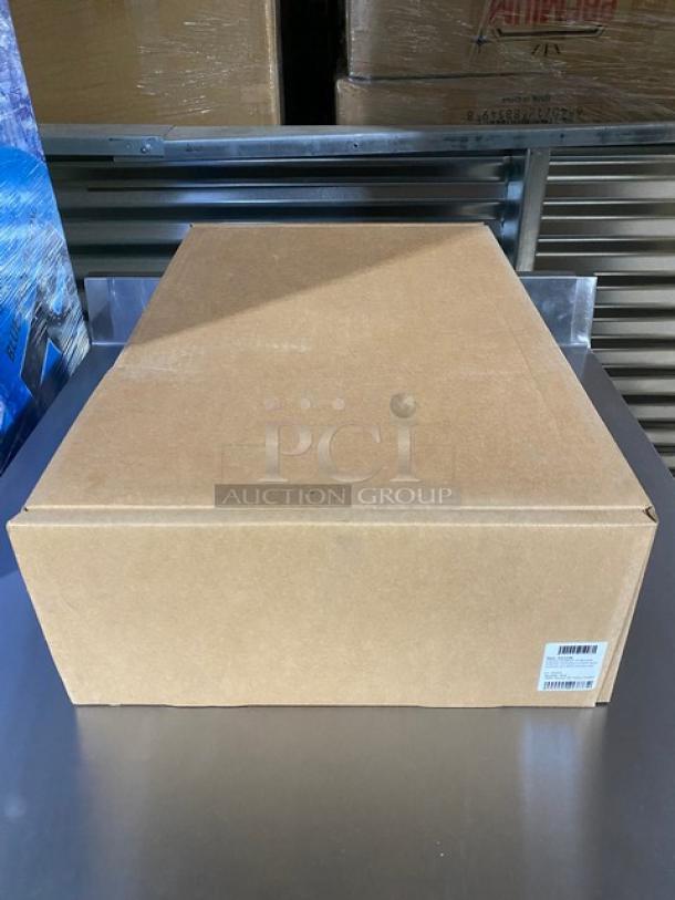 Sealed box of Mauviel 1830 M'Cook Series Chef Pan, Model 521228, with product label visible.
