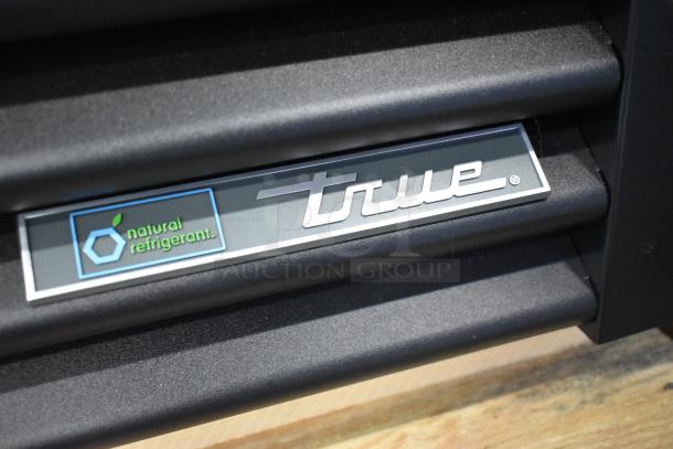 True GDM-23-HC cooler label showing brand and natural refrigerant marking.