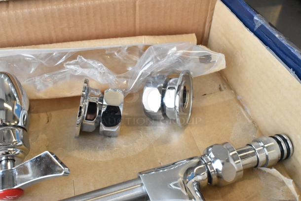 Brand new Waterloo 750PRW816 wall-mounted pre-rinse faucet, 16" add-on, 8" centers, slight scratches, chrome finish.