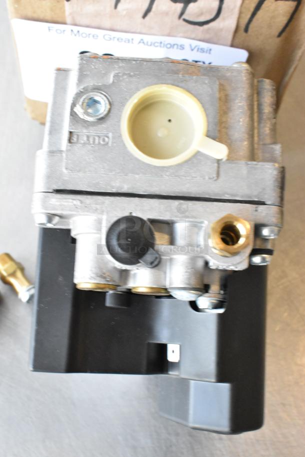 Brand new Cleveland KE003671-1 valve to replace SK2488200, minor scratches, metallic finish, includes attached fittings.