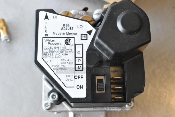 Brand new Cleveland KE003671-1 replacement valve, minor scratches, White Rodgers model 36H64-406, Made in Mexico.