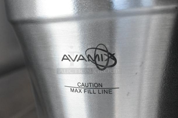 AvaMix stainless steel blender pitcher, new with scratches and dents, no lid, marked with max fill line caution.