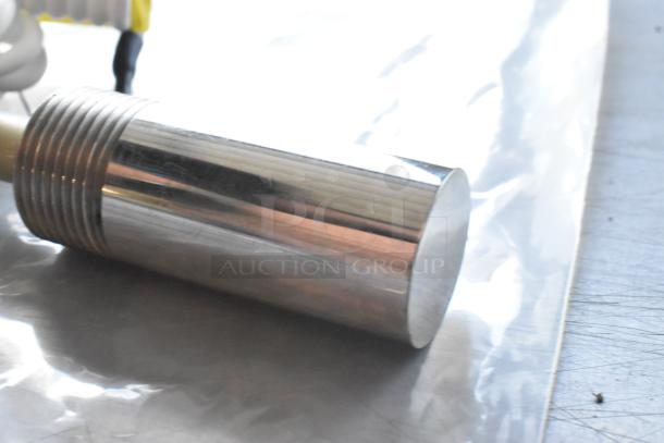 Shiny metallic cylinder with threaded section, part of a new scratch and dent sale including H91DA-13 Unit, Manitowoc FSG Cord.