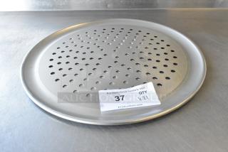 Brand new scratch and dent metal round perforated baking sheet, with quantity label, auction item 37.