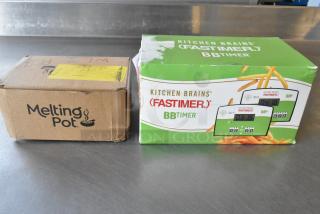 Two brand new items: a Kitchen Brains Fastimer BBTimer in a green box and a Melting Pot in a brown box, both labeled.