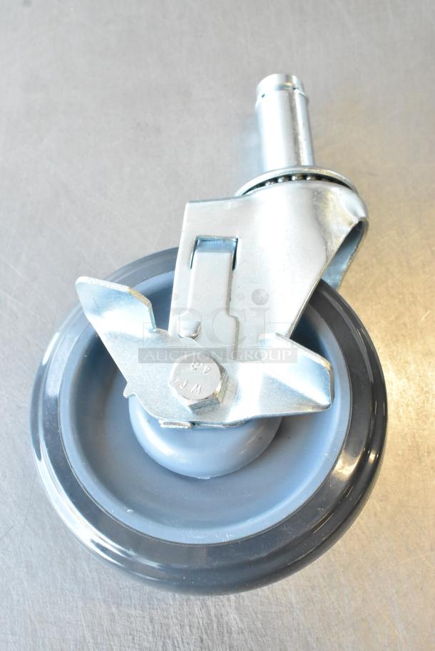 Brand new Regency 5" polyurethane caster with brake, scratch and dent, model 3591201148. Durable equipment stand wheel.