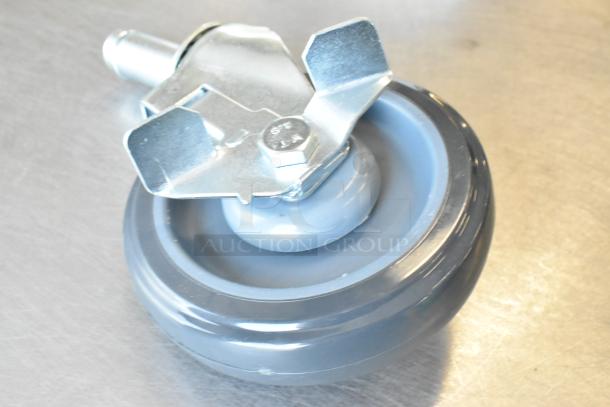 Lot of 3 Regency 5" polyurethane work table casters with brake; new scratch and dent condition.