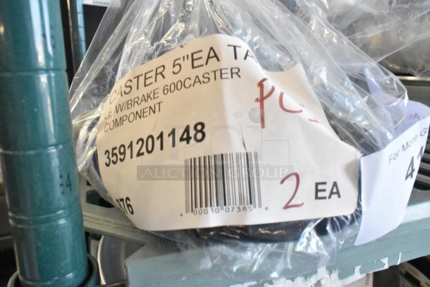 Brand new lot of 3 Regency 5" polyurethane casters with brake, model 3591201148, in packaging with visible label and barcode.