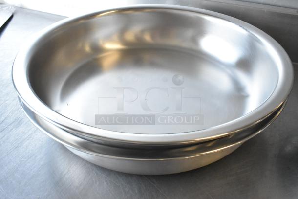 Brand new Acopa Voyage 407IND6FP 6 Qt. round chafer food pan, scratch and dent, stainless steel finish.