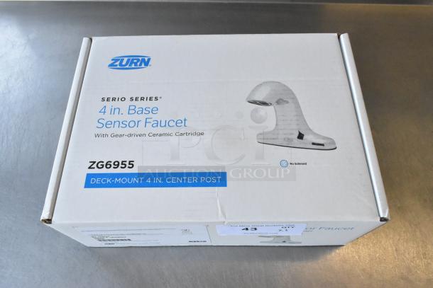 Zurn ZG6955 Sensor Faucet box, brand new, minor scratches and dents. Features a gear-driven ceramic cartridge.