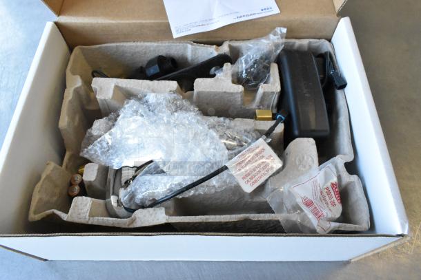 3 Zurn ZG6955 faucets in packaging, some scratch and dent. Includes components and labels. New condition with issues.