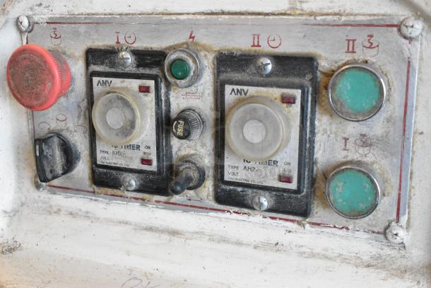 Control panel of HL-17066-K Spiral Dough Mixer with ANV timers, red and green buttons, and visible wear.
