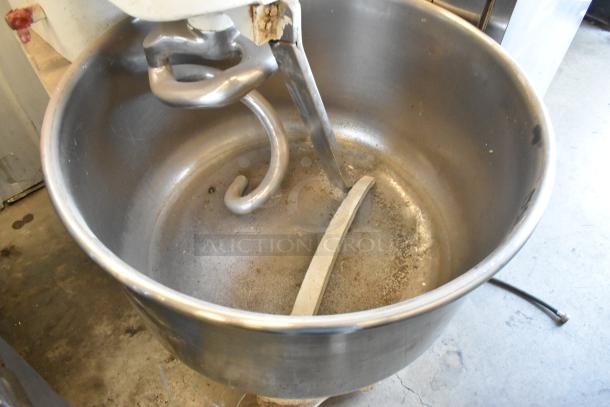 HL-17066-K metal spiral dough mixer with stainless steel bowl, bowl guard, and dough hook attachment. Used condition.