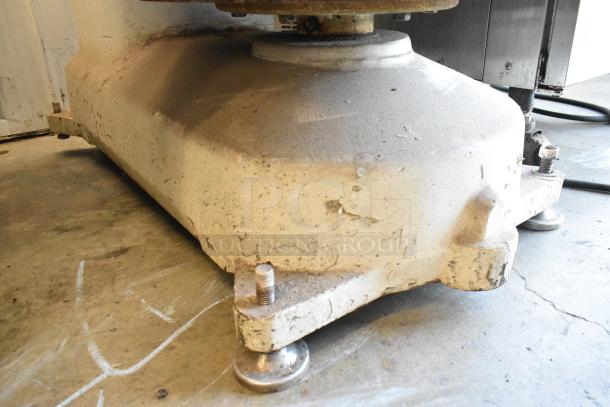 HL-17066-K Metal Spiral Dough Mixer base showing signs of use; sturdy construction, 220V, 3 Phase setup.