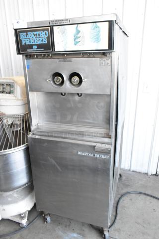 Electro Freeze 30TN-CAB-113 Stainless Steel Commercial Floor Style 2 Flavor w/ Twist Soft Serve Ice Cream Machine on Commercial Casters. 208/240 Volts, 1 Phase. - Item #1199679