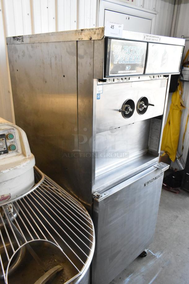 Electro Freeze 30TN-CAB-113 stainless steel soft serve ice cream machine on casters. Dual flavor with twist. 208/240V, 1 phase.