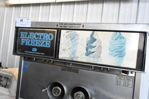 Electro Freeze 30TN-CAB-113 soft serve machine, stainless steel, 2-flavor with twist, commercial floor style, on casters.