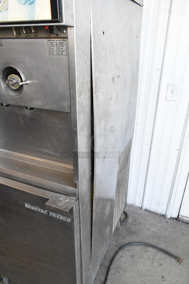 Electro Freeze 30TN-CAB-113 stainless steel soft serve machine, dual flavors with twist, on casters, 208/240V, 1 phase.