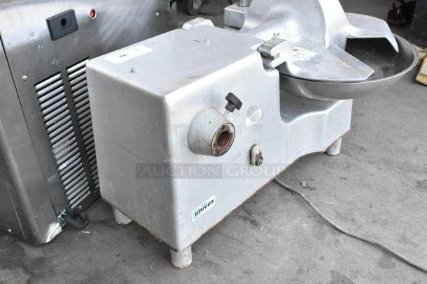 Univex Metal Commercial Countertop Buffalo Chopper with S Blade, used. Features metal construction, Univex label, and visible wear.