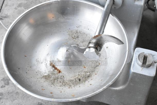Univex metal commercial countertop buffalo chopper with S blade, showing used condition with signs of rust and wear.