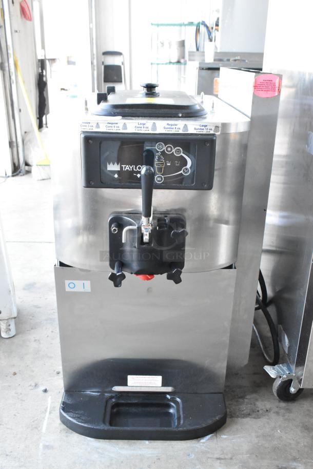 Taylor C709-27 stainless steel soft serve ice cream machine, countertop model, single flavor, air-cooled, 208-230V, 1 phase.