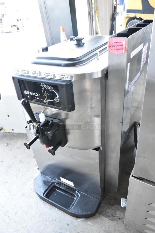 Taylor C709-27 stainless steel single flavor soft serve machine, air cooled, 208-230V, 1 phase, excellent condition.