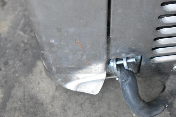 Taylor C709-27 stainless steel ice cream machine base showing slight surface rust and wear, indicating used condition.