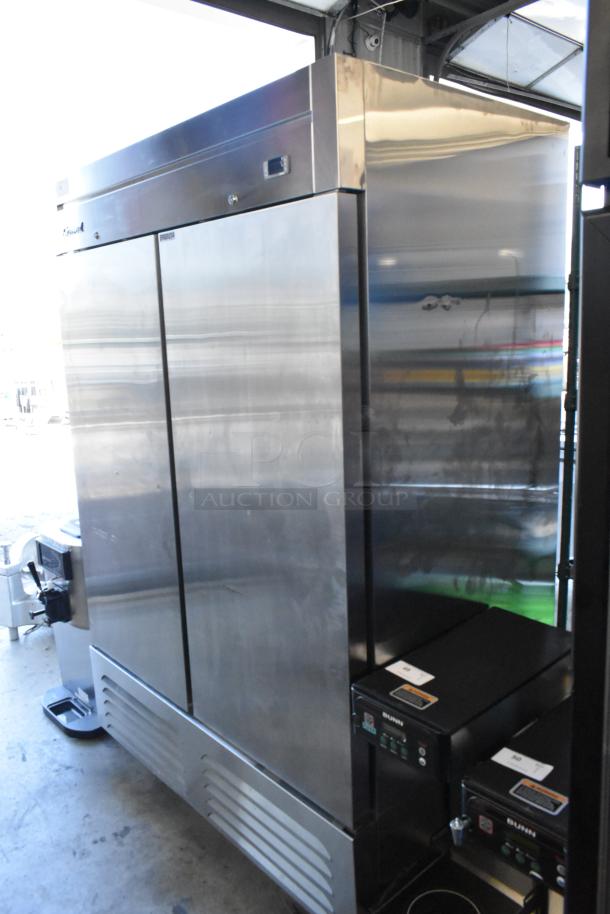 Grand GT-54R-HC stainless steel commercial 2-door reach-in cooler with poly coated racks and casters, 115V, 1 phase.