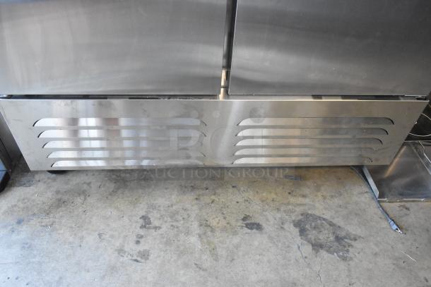 "Grand GT-54R-HC stainless steel 2-door reach-in cooler with poly-coated racks on casters, 115V, 1 phase."