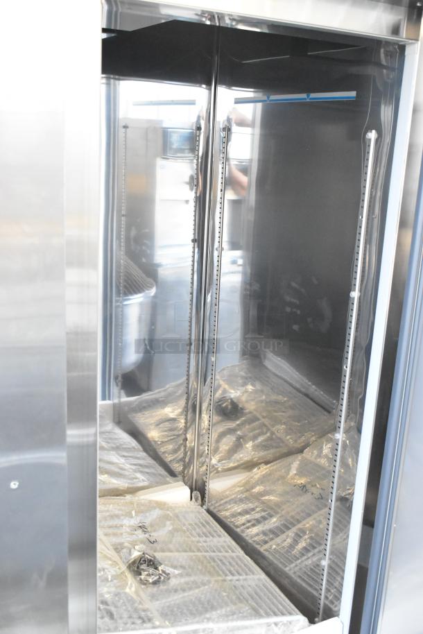 Grand GT-54R-HC 2 Door Stainless Steel Cooler with poly coated racks and commercial casters, 115V, 1 Phase.