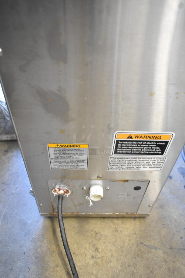 Bunn ITCB-DV Stainless Steel Commercial Iced Tea Machine back view, visible warning labels and power cable, fair condition.