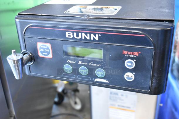 Bunn ITCB-DV stainless steel iced tea machine, features digital controls, 120 volts, 1 phase. Model display and buttons shown.
