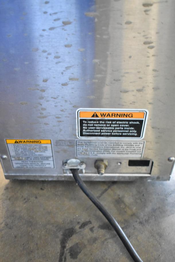 Bunn ITCB-DV Stainless Steel Iced Tea Machine, visible warning labels, 120V, 1 Phase, in used condition.