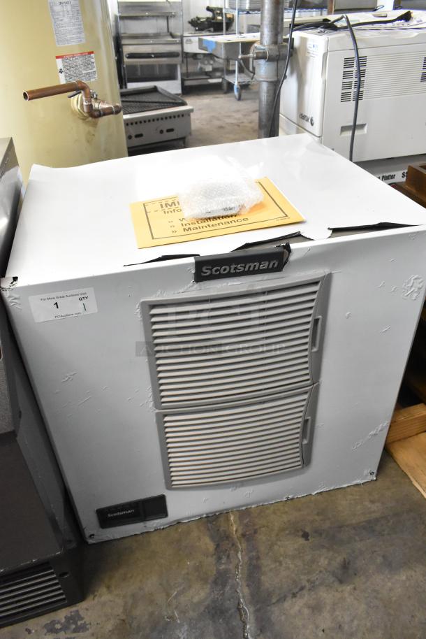 Brand new 2025 Scotsman MC1030SA-32A ice machine, small cube, 1077 lb capacity, 208/230V, 1 Phase, visible dents on unit.