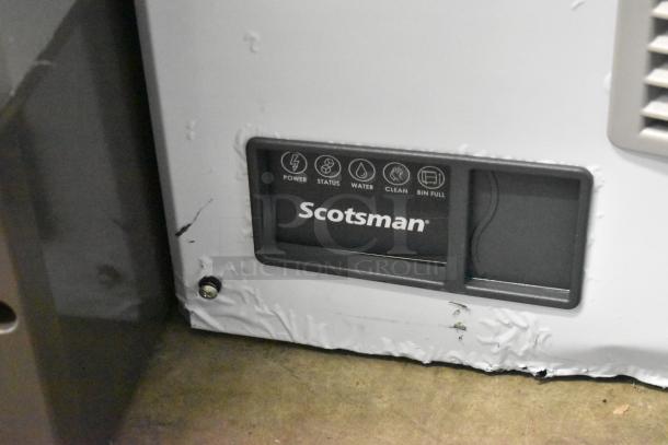 BRAND NEW Scotsman MC1030SA-32A ice machine, small cube, 1077 lb capacity, scratch and dent. Control panel visible.