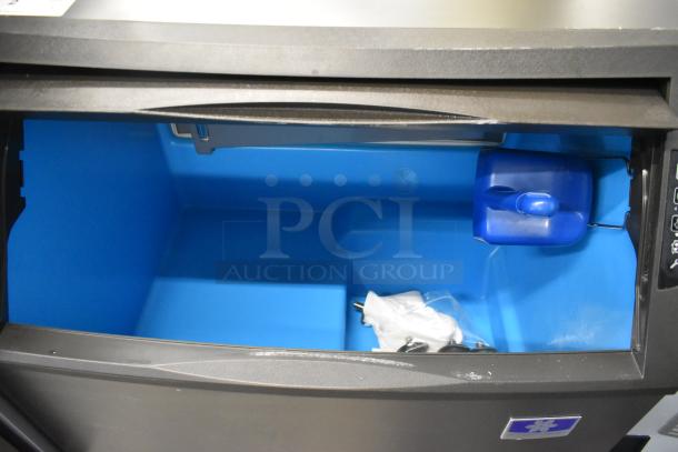 Brand new Manitowoc UDF0310A-261Z ice machine, scratch and dent, 30" undercounter model with blue interior, 119 lb. bin.