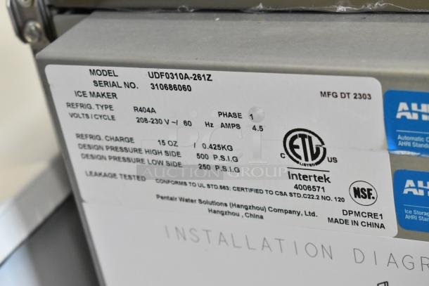 Manitowoc UDF0310A-261Z ice machine label, 208-230V, 1 phase, ETL, NSF certified, R404A refrigerant, 119 lb. bin, new condition.