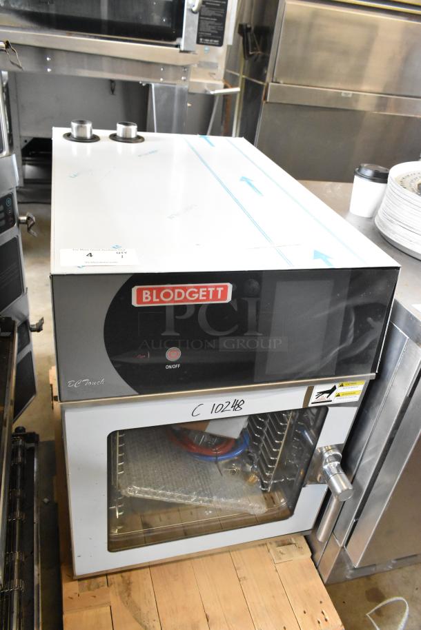 Brand new Blodgett BLCT6E/CSII CPE 1.06 HE1 stainless steel combi convection oven, view-through door, metal racks, stacking kit.