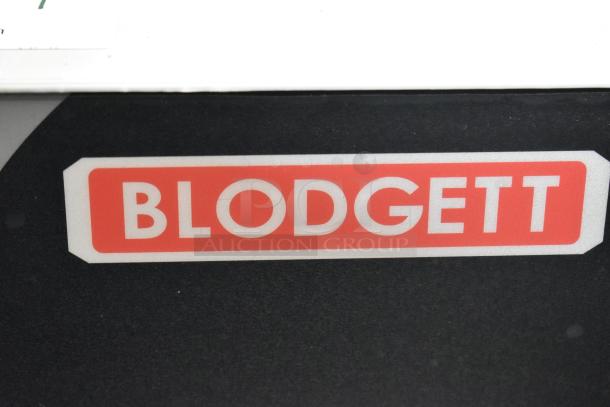 "Blodgett logo on commercial electric Blodgett BLCT6E/CSII CPE 1.06 HE1 combi convection oven; stainless steel exterior."