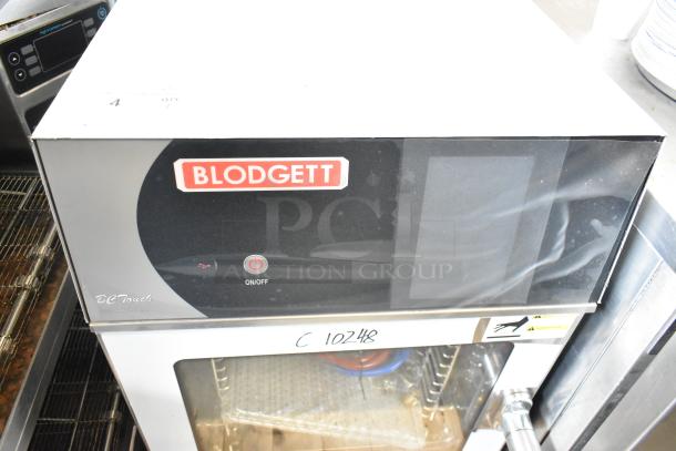 Stainless steel Blodgett BLCT6E/CSII CPE 1.06 HE1 combi convection oven, new, view-through door, metal racks, stacking kit.