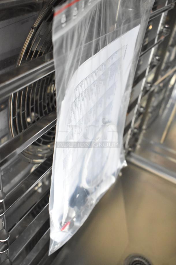 BRAND NEW SCRATCH AND DENT Blodgett AETE101R stainless steel combi convection oven, 208V, 3-phase, interior fan view.