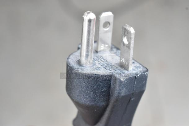 Close-up of a power plug fitting the 2022 Alto Shaam 1200-UPS Heated Holding Cabinet, showing three prongs.