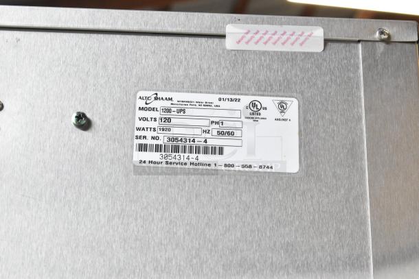 2022 Alto Shaam 1200-UPS stainless steel heated holding cabinet with label showing 120 volts, 1 phase, 1920 watts.