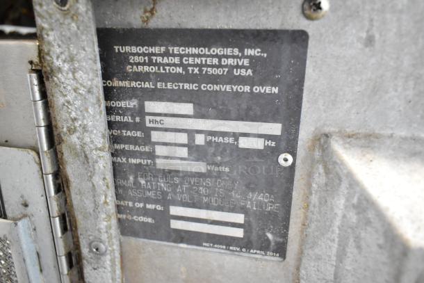 Turbochef HhC2020 commercial electric conveyor oven label showing model, voltage, and manufacturing details.
