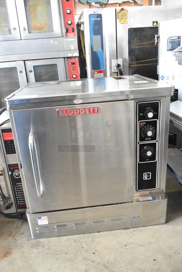 2023 Blodgett DFG-50 stainless steel commercial convection oven with solid door, metal racks, and thermostatic controls.