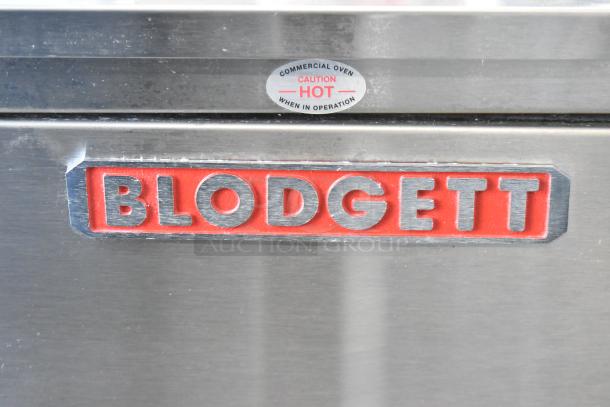 2023 Blodgett DFG-50 convection oven logo detail; stainless steel with safety label indicating "Caution Hot".